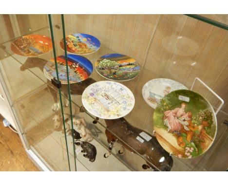 Set of four Barbara Furstenhofer Poole pottery plates decorated with the four seasons and three other Poole pottery dishes (7