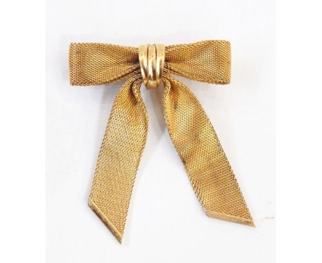 Vintage gilt bow brooch marked 'Christian Dior, made in Germany' 