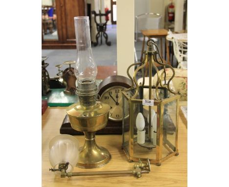 An oak mantle clock, a brass oil lamp, a gilt brass lantern light fitting and a converted gas mantle.