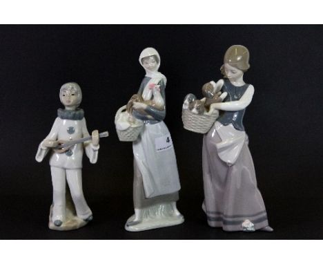 Two Lladro figures of girls and a further Spanish figure.