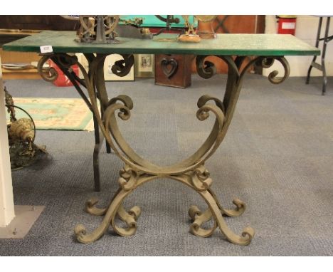 An Arts and Crafts heavy wrought iron console table with leaded mirror thick glass top (154 x 50 x 77cm)