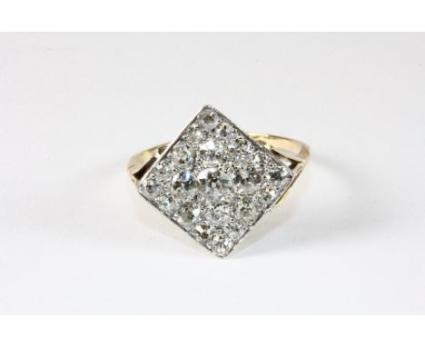 A lovely yellow metal (tested 18ct gold) square pave set antique diamond ring. Size R