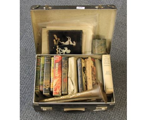 A vintage case of first edition books, military items etc