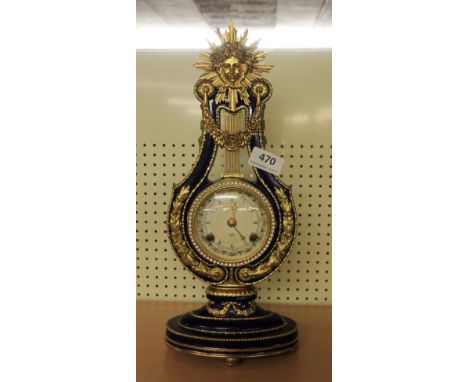 A Franklin Mint enamelled mantle clock