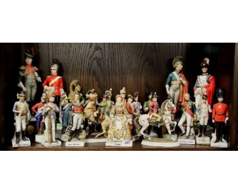 A collection of ceramic and other soldier figures H.21 and 37cm