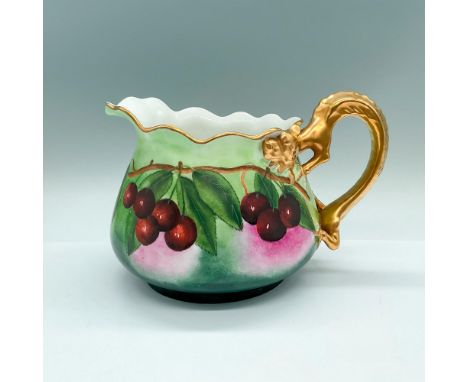 Pitcher decorated with red cherries, and a gilded handle formed as a dragon. Jean Pouyat backstamp. Issued: 1890-1902Dimensio