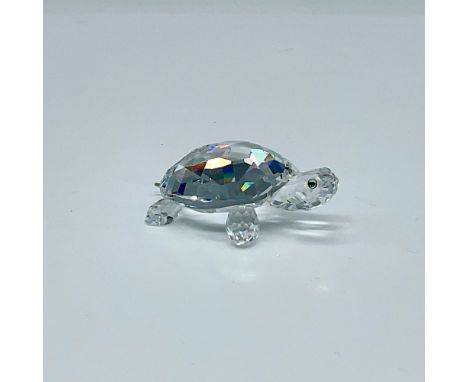 Clear body with yellow and black crystal eyes. Swarovski backstamp. This item has its original box which measures 2.5"H x 3.2