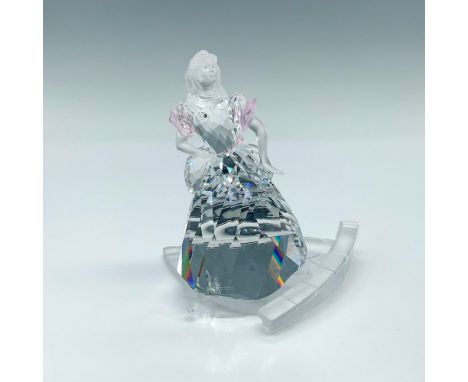 Depicts a clear Cinderella with pink accents leaving the ball when she loses her shoe. Swarovski backstamp. This item has its