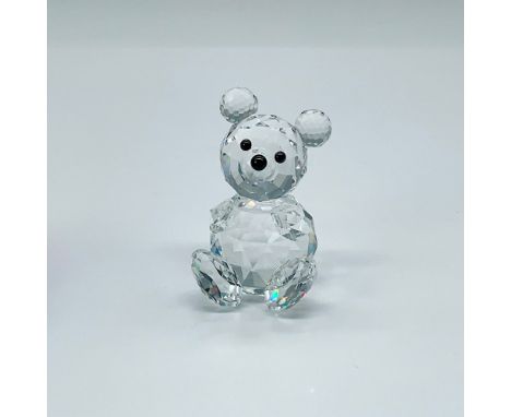 This Swarovski crystal seated bear is made from clear, faceted crystal, with black eyes and nose. He was part of the Woodland