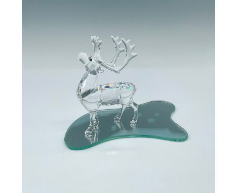 This Swarovski crystal reindeer comes complete with a display mirror with reindeer footprints on. Made from clear crystal, th