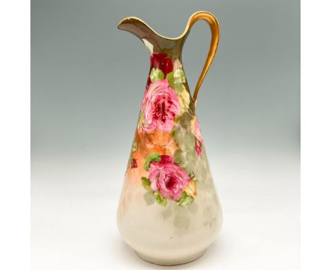 Floral design with gilt rim and handle. Signed. Limoges Art China backstamp. Issued: 20th centuryDimensions: 11"H x 5.25" dia