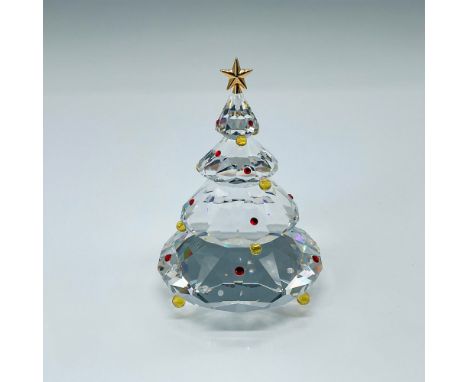 This tree was in the Cheerful Times group. The tree is topped with a metal star and has colored crystal ornaments on it. Swar