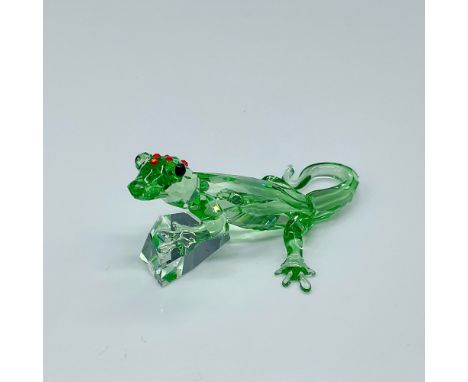 This limited-edition Swarovski crystal Gecko is made from green crystal, with black eyes, and red stones on the top of his he