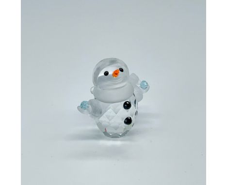 Part of the Cheerful Times collection. Lead crystal mini snowman with frosted face, scarf, and hands. Swarovski etched backst