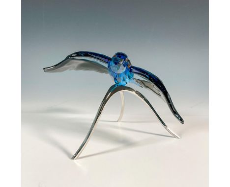 Graceful retired bird that was part of the Silver Lake collection. Made from blue turquoise and black diamond crystal, it is 