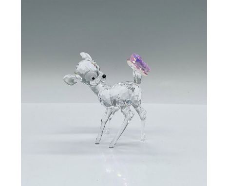 A clear crystal figure of the lovable Disney deer, Bambi, with jet crystal eyes and nose. He is admiring an Aurora Borealis R