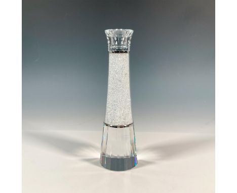 Very elegant lead crystal large candle holder that was part of the Home Accessories collection. The center section is filled 