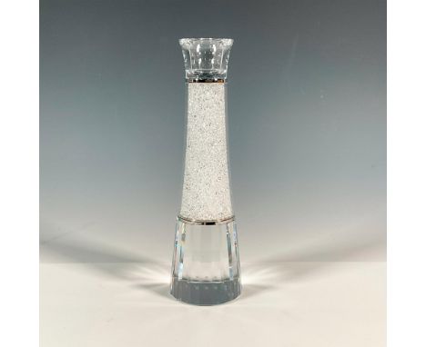 Very elegant lead crystal large candle holder that was part of the Home Accessories collection. The center section is filled 