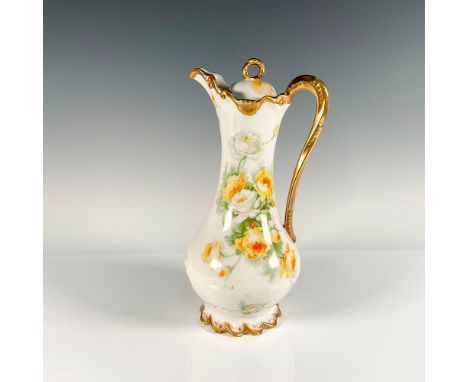 Elegant tall pitcher with white and yellow rose motif, heavy gilded rim, handle and scalloped base. Backstamped Coronet Limog