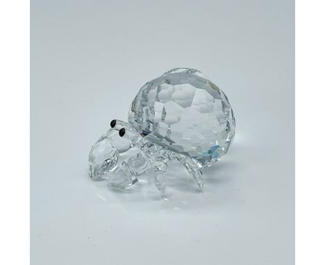 This Swarovski crystal hermit crab was part of the Aquatic Worlds family. It has a body in faceted clear crystal and Jet crys