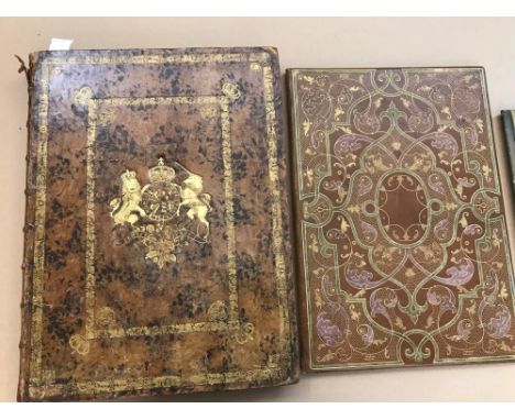 An 18th century leather binding, later used as a scrap book, with royal arms 'Semper Eadem' motto in gilt to upper board, ink