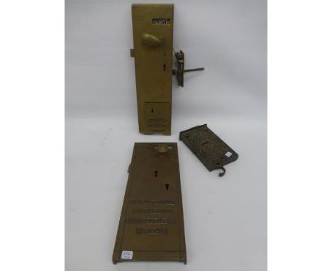 A brass Lockerbie & Wilkinson of Birmingham door lock (Vacant/Engaged) and two others. 