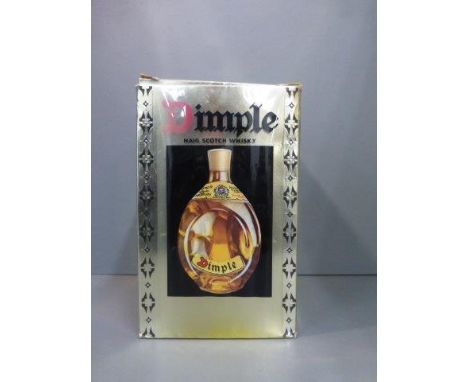 A boxed single bottle of Dimple Old Blended Scotch Whisky. 