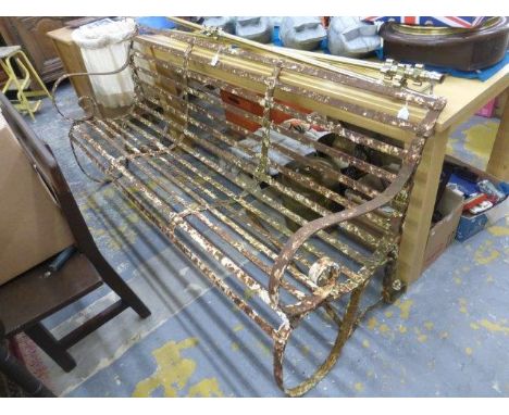 A Victorian wrought iron garden bench. 