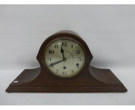 An Edwardian oak cased mantle clock of large proportions, with Westminster chimes.