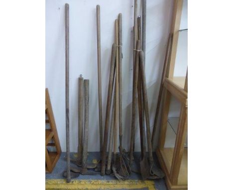 Assorted early 20th Century and later wooden handled garden tools etc. 