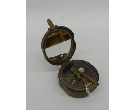 A reproduction compass stamped Thos. J Evans Esq. London 1914.