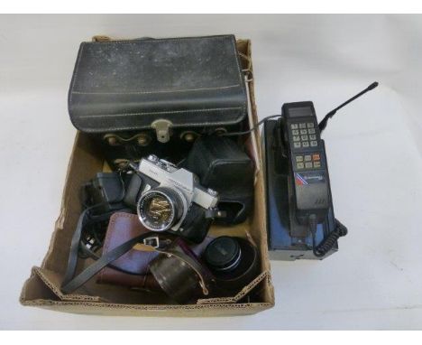 An assortment of collectables including a cased camera and a Motorola 5800X cellular mobile telephone. 