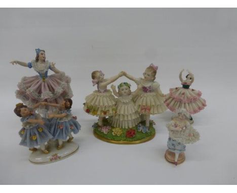 Five Dresden figures all with lacework ceramic skirts. 