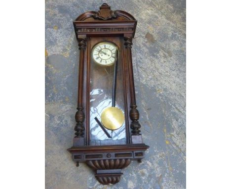 A Vienna weight driven wall clock. 