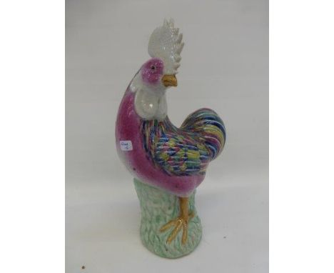 A large Chinese ceramic chicken with multi-coloured plumage. 