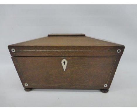 Yesterday's World Museum Victorian Kitchen - a Victorian rosewood and MOP inlaid sarcophagus shaped tea caddy. 