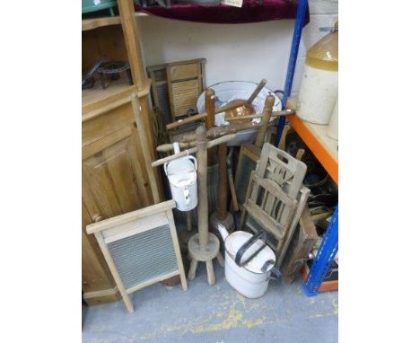 Yesterday's World Museum Scullery - a collection of wash boards, wash dollies, an enamel watering can etc. 