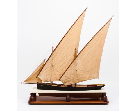 A model of the tall shipWood, textile and metal of three lateen sailsWooden display stand20th century93x85 cm