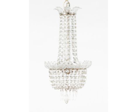 A small three light chandelierGlass and crystal70x35 cm
