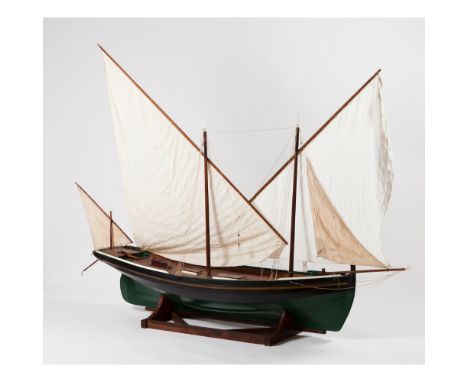 A model sailboatWood, metal and textile Wooden display stand20th century160x226 cm