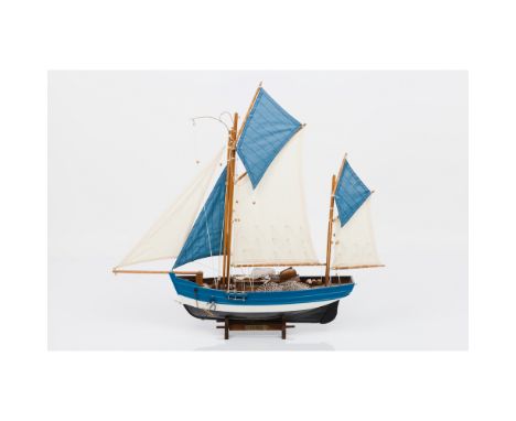 A "Thonier" model fishing sailboatWood, metal and textile Wooden display stand57x62,5 cm