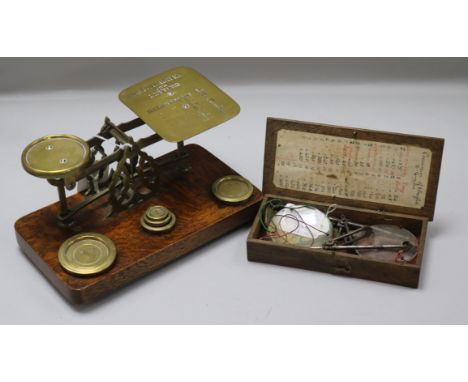 A set of postal scales and a set of apothecary scales