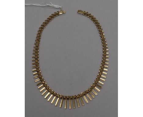 A stylish early 1960's 14ct gold fringe necklace, with pyramid shaped links, 41.5cm