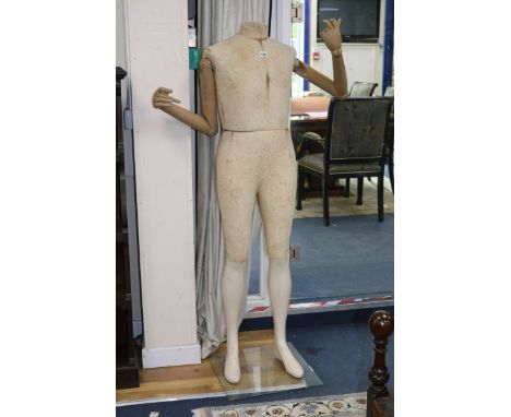 A modern articulated mannequin height 60in.