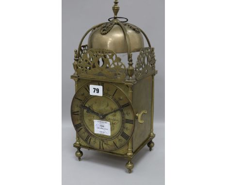 A lantern clock with later movement height 39cm