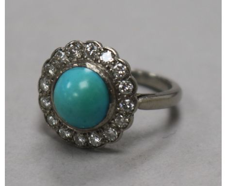 A white metal, turquoise and diamond cluster ring, size L.