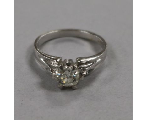 A 14ct white gold and solitaire diamond ring, size K.