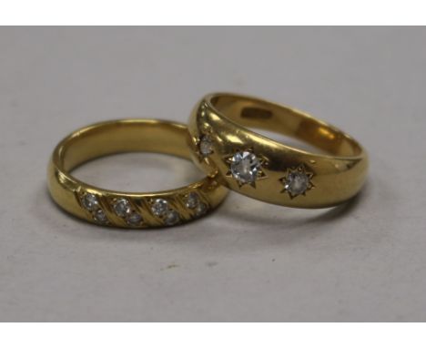 An 18ct gold and gypsy set three stone diamond ring and one other 18ct gold and diamond ring.