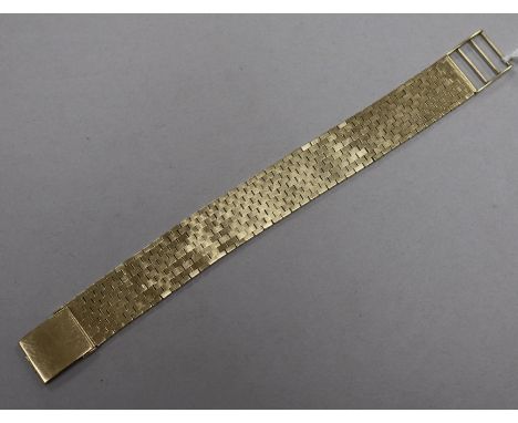 A 1960's 9ct gold brick link bracelet, approx. 18cm.