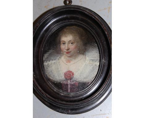 17th Century miniature oval oil on board, portrait of a lady wearing lace collar, 3.5ins x 3ins, housed in a moulded fruitwoo